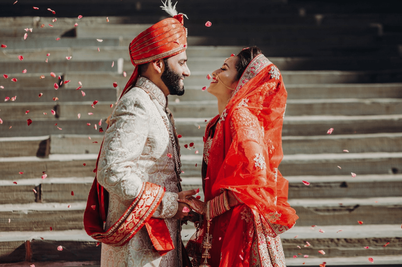 A wedding couple looking happy during their wedding