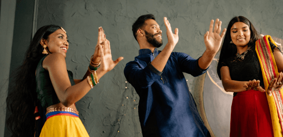 People enjoying and dancing at Naavy Nammavaru Celebrations